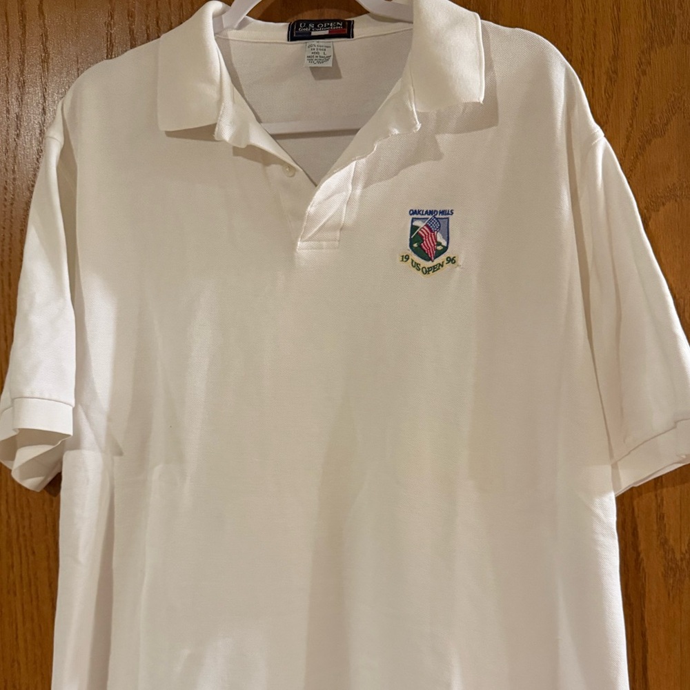 Men’s U.S. Open polo, size large.